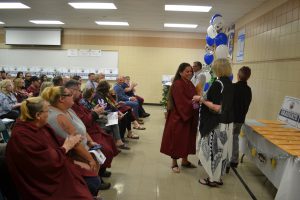 Graduate receiving gifts