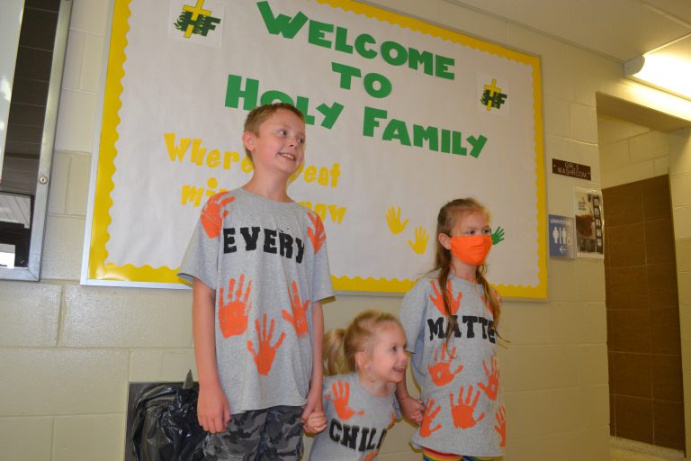 siblings in orange