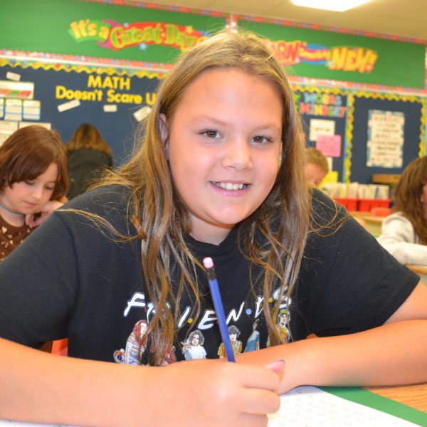 close up of student smiling at camera