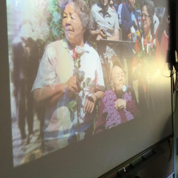 indigenous woman on tv screen