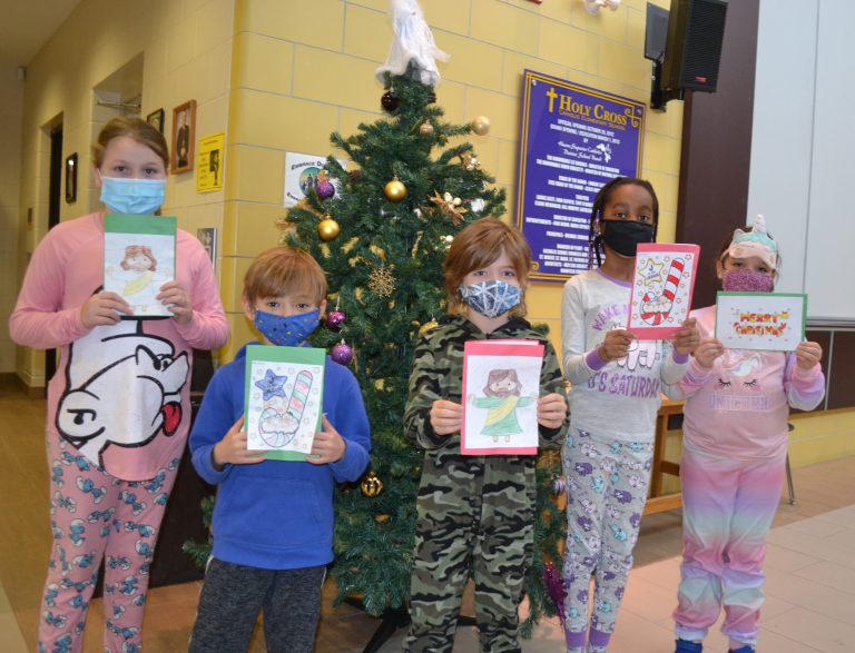 Holy Cross students with cards