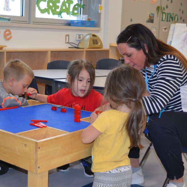 Educator with kindergarten students