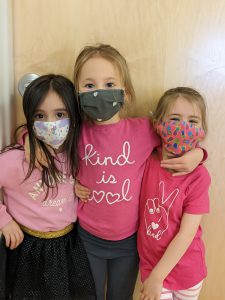 three girls in pink