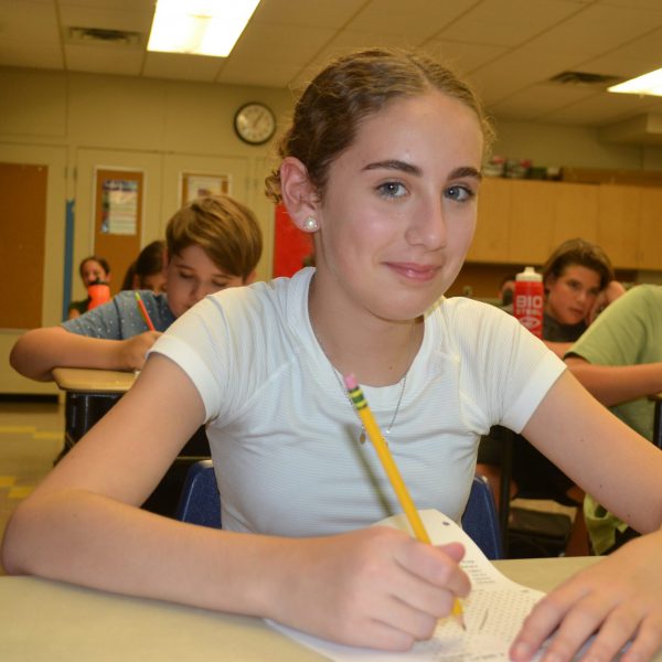 female student sitting at desk