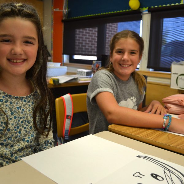 two female students at their desk