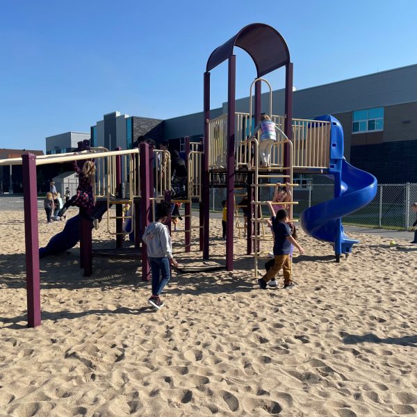 students on play structure