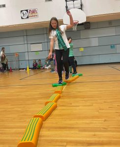 female student balancing