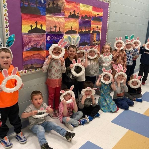 Students show off wreaths they created for Easter