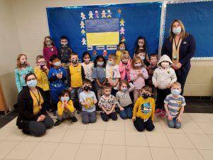 kindergarten students wearing yellow and blue