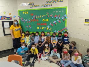 kindergarten students in yellow and blue