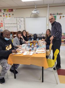 Principal Gardi with staff members