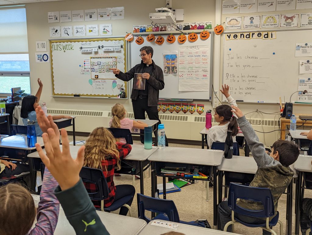 Father Shannon fields questions from students