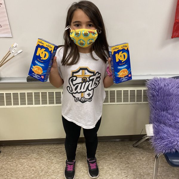 student with boxes of food