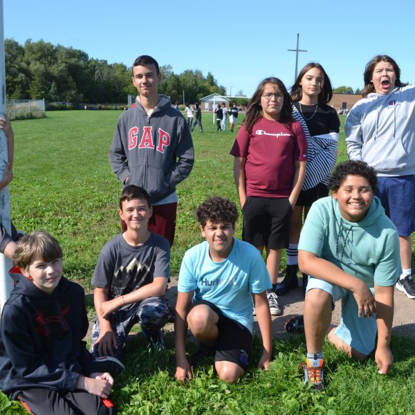 large group of students post for photo