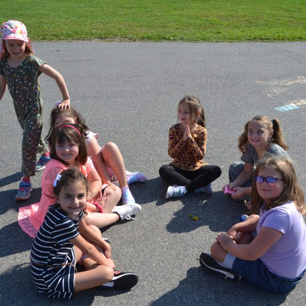 students playing a game in the school yard