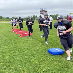 female football players perform footwork drill