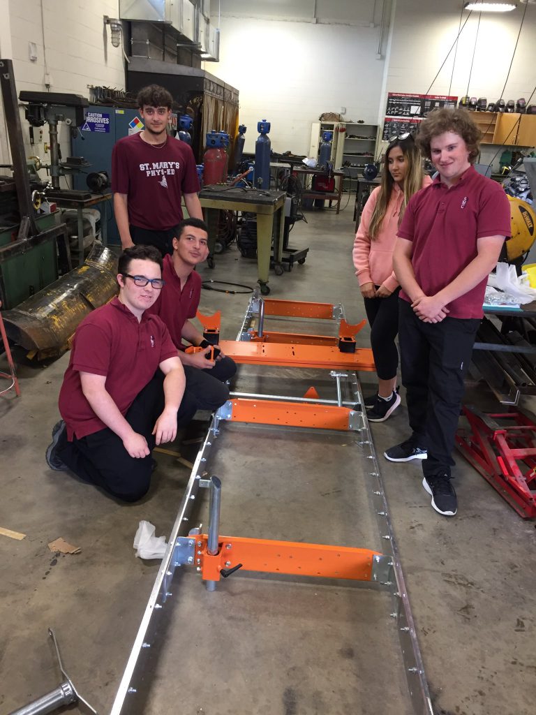 Students constructing the portable sawmill and St. Mary's College