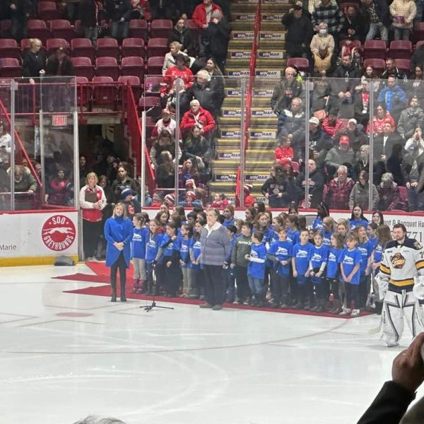 Student choir at Greyhounds game