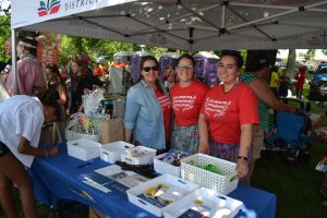 Curriculum team members hosting the HSCDSB booth at the Indigenous Day Pow Wow